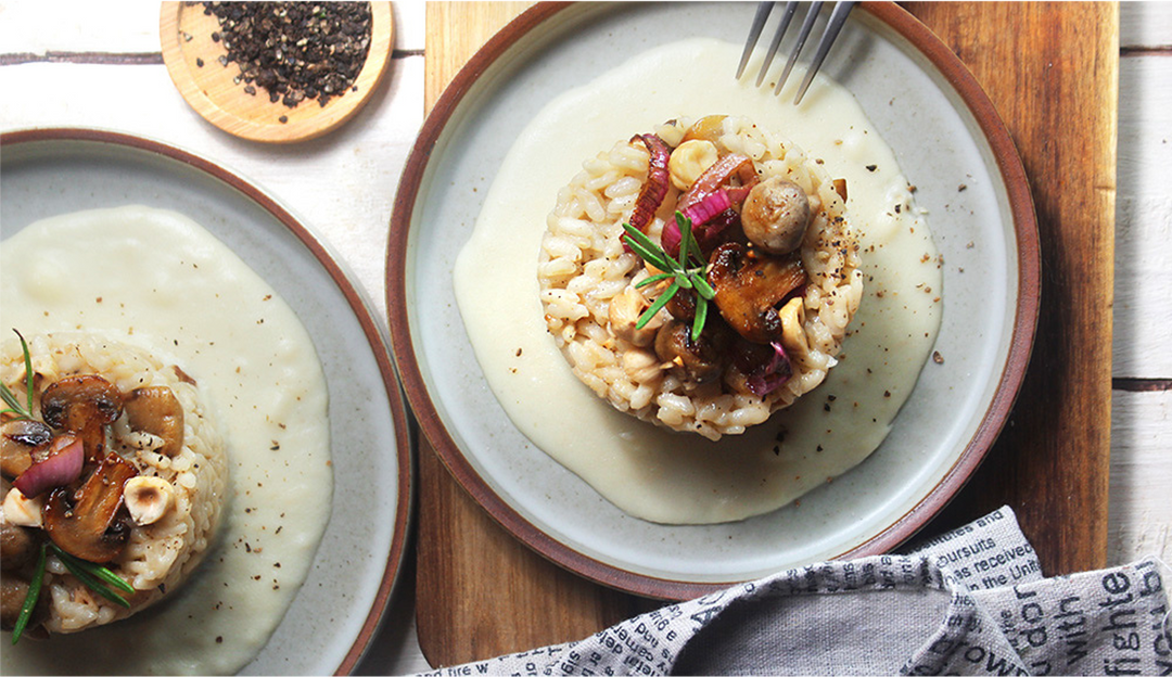 RISOTTO FUNGHI E NOCCIOLE  su fonduta di parmigiano